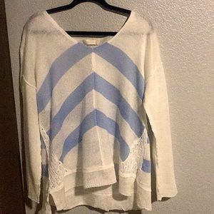 Light cream and light blue sweater